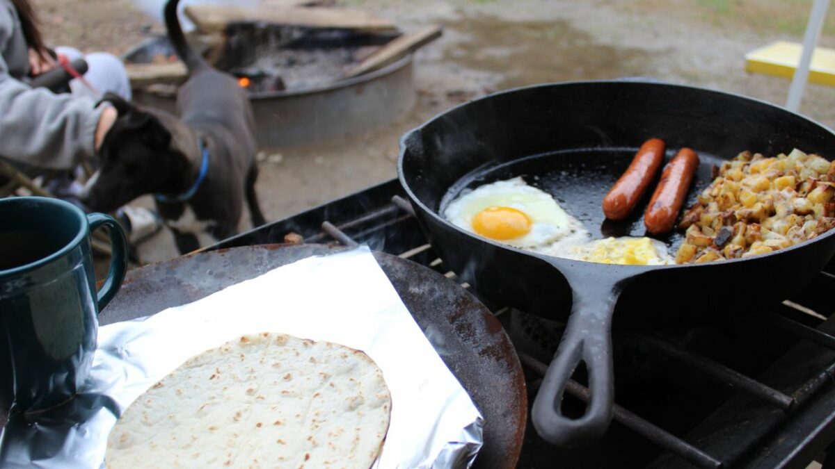 Wild campers preparing breakfast